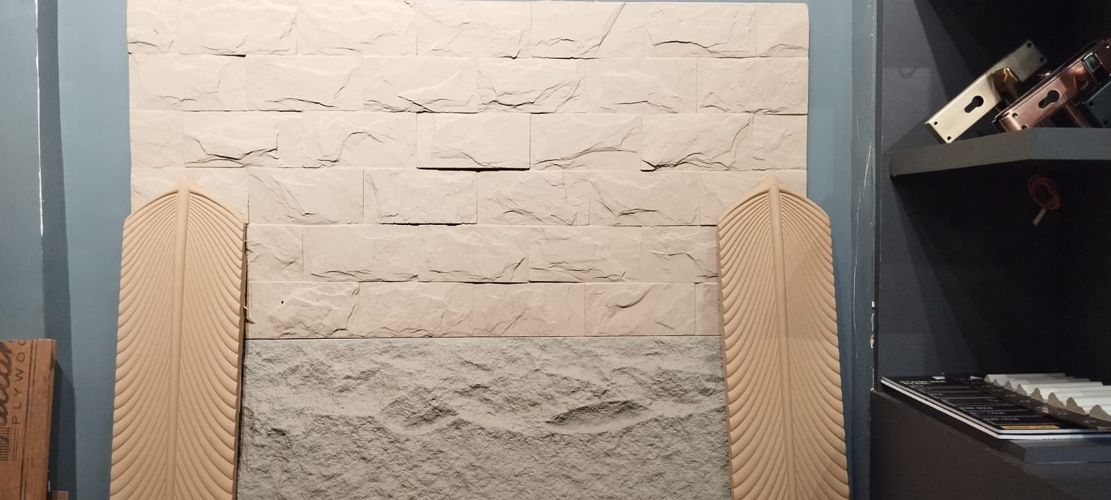 Stone cladding and fluted wall panels for living room interiors in Morigaon, Assam